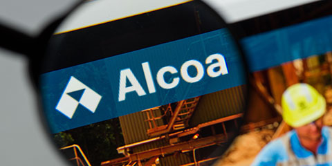 The Alcoa logo displayed over machinery