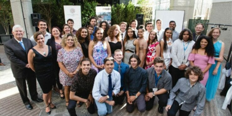 Group photo of students and teachers at the IAES dinner dance