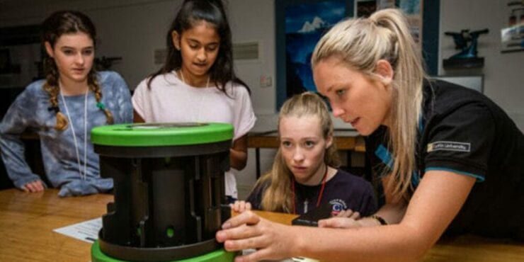 Female students participating in STEM outreach